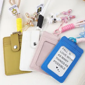 Detail of portable PU leather card holders with braided ropes and balloon dog charms