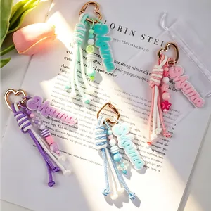 Handcrafted braided keychains with colorful beads and Mama tags for bag accessories