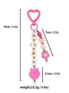 Detail view with dimensions for the pink silicone beaded MAMA heart keychain charm.
