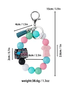 Porte-clés infirmière en perles de silicone avec pompon, dimensions 15cm et poids
