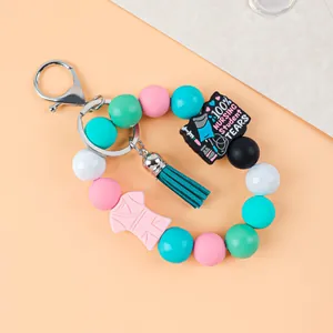 Porte-clés bracelet en perles de silicone pour infirmière avec gland en PU et breloque