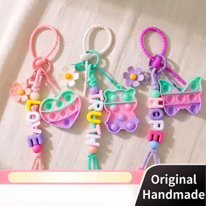 Colorful Silicone Beaded Bag Charm Silicone Pop It Stress Relief Toy Keychain Macaron Flower Alphabet Heart Bear Butterfly Pattern Pendent For Women Kids Bag Decoration Gift