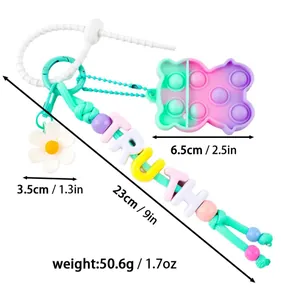 Colorful beaded lanyard with bear fidget toy and daisy charm for bags