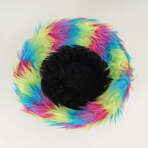 Detail view showing the vibrant colorful faux fur and black quilted lining of this winter hat