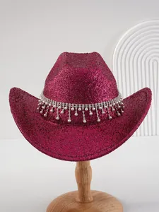 Macro detail of magenta glitter cowboy hat with pearl rhinestone fringe decoration