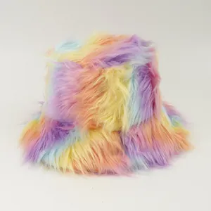 Close-up view of a soft rainbow faux fur bucket hat with pastel gradient colors.