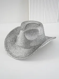 Detailed view of a sparkling silver Western cowboy hat with textured finish and curved brim