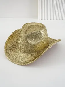 Detailed view of gold glitter western cowboy hat with shiny brushed texture for party