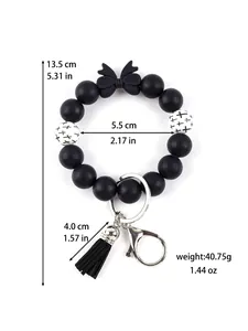 Detailopname van siliconen kralenarmband met strik en kwastje met afmetingen.