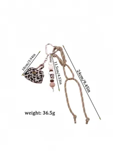 Detailed size guide for leopard print mini purse keychain with beaded charms.