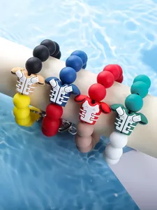Close-up of four football jersey themed silicone beaded keychains in vibrant colors