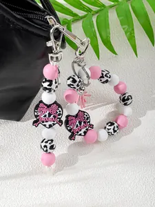 Vista detallada de llavero de pulsera de cuentas de silicona rosa con dije de MAMA