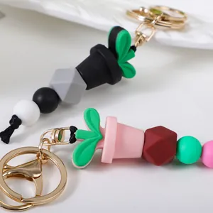 Vibrant silicone bead keychain with lobster clasp and cute coffee cup charm design