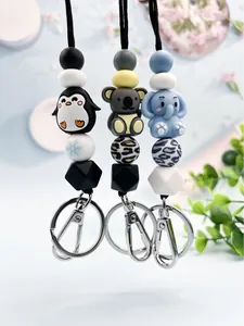 Cute silicone bead lanyards with penguin koala and elephant charms for ID badges.