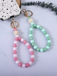 Cordino per cellulare e portachiavi in perle di silicone colorate con elegante chiusura dorata