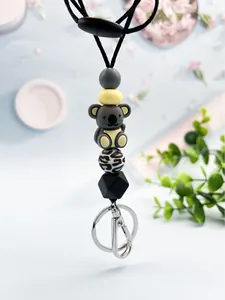 Detailed view of handmade silicone bead lanyard with cute koala and leopard print