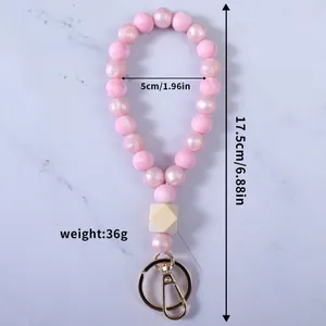 Portachiavi da polso con perline di silicone rosa confetto con peso 36g e misure