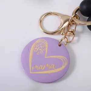 Kralen sleutelhanger met paarse mama hart hanger en zwarte siliconen kralen decor