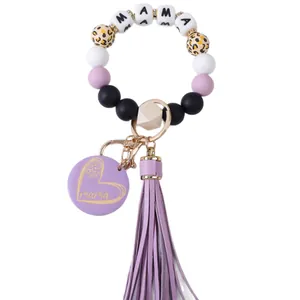 Siliconen kralen sleutelhanger armband met MAMA letters en stijlvolle paarse kwast