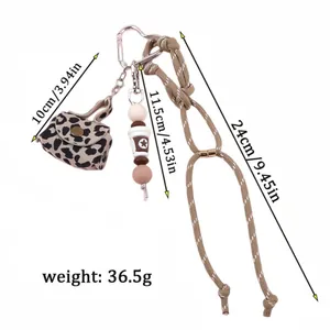 Leopard print coin purse keychain set with braided rope and beaded charm measurements