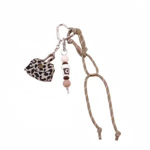 Leopard print leather coin purse keychain with beaded coffee charm and braided rope