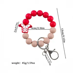 Silicone beaded keychain bracelet with red football jersey charm and size markings