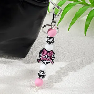 Llavero de cuentas de silicone con estampado de vaca y colgante de corazón rosa MAMA