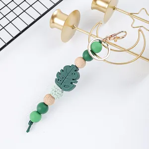 Kreativer Silikon-Blatt-Perlen-Schlüsselanhänger mit grünem Monstera-Blatt-Anhänger.