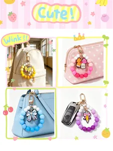 Set of colorful silicone bead wristlet keychains shown on backpacks and handbags
