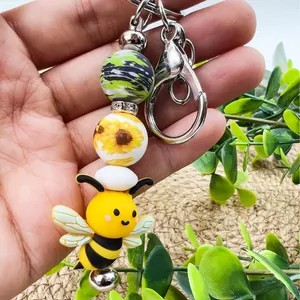 Cute bee silicone beaded keychain with sunflower and camo beads for bags