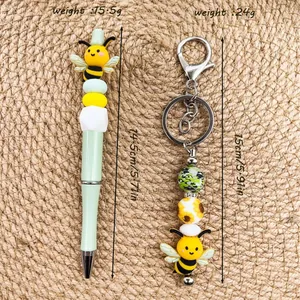 Cute honey bee silicone beaded pen and matching keychain set with size and weight markers