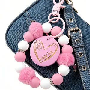 Eleganter rosa Silikonperlen Schlüsselanhänger mit weichem Pelzball und Mama Herz