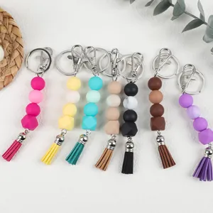 Colorful DIY silicone bead keychains with octagonal beads and matching tassels for bags and keys