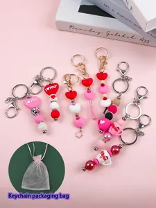 Ensemble détaillé de porte-clés en perles silicone Saint-Valentin avec pochette