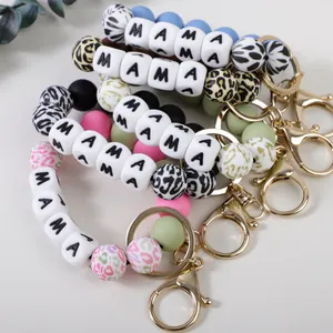 Élégant bracelet porte-clés en perles de silicone avec lettres MAMA et motif léopard