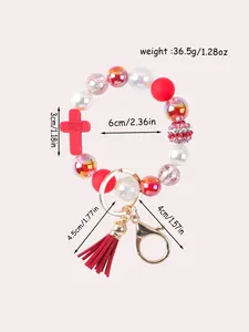 Detailed size and weight specifications for silicone beaded keychain with red tassel and cross