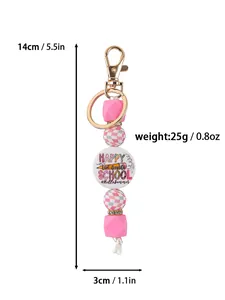 Detailansicht eines rosa Silikonperlen-Schlüsselanhängers mit Maßen 14cmx3cm und Gewicht 25g