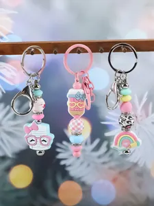 Close-up of cute silicone beaded keychains with colorful charms and pastel beads