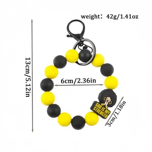 Yellow and black silicone bead keychain bracelet with God is my strength charm 42g