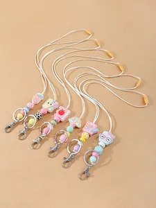 Collection of cute silicone lanyard keychains with colorful cartoon charms