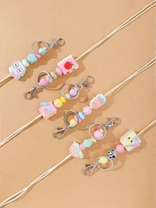 Five colorful cute silicone beaded lanyards with various school-themed charms.