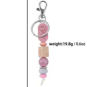Pink rose silicone and natural wood bead keychain pendant for bags with weight info