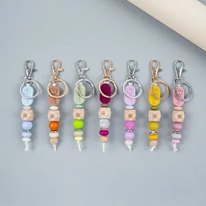 Colorful rose print silicone and wooden bead keychains for women's bags and accessories