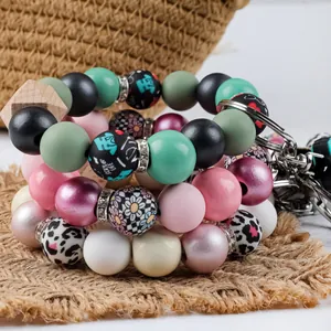 Llavero pulsera de cuentas de silicona enfermera con motivos floraux y scrub life