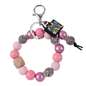 Llavero pulsera de enfermera con cuentas de silicona rosas y flores con amuleto