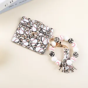 Close-up of baseball heart pattern card holder with silicone bead wristlet keychain