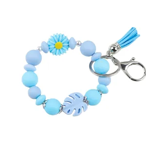 Handgefertigtes blaues Silikon Perlenarmband Schlüsselanhänger mit Quaste und Blattanhängern