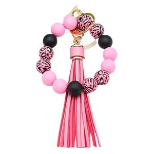Handmade pink leopard print silicone beaded keychain wristlet with pink PU tassel