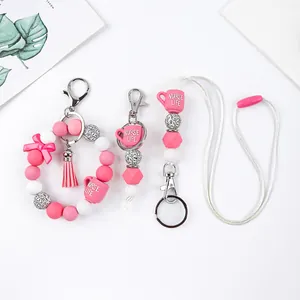Stylish Nurse Life silicone beaded lanyard and bracelet keychain set with pink coffee cup charms.