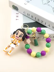 Nahaufnahme von KPOP Silikon Perlen Schlüsselanhänger mit Puppe und Quaste